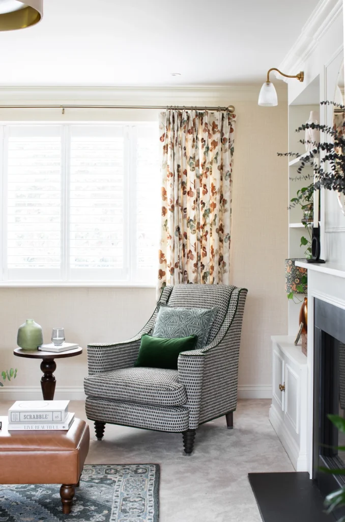 Interior designer in Hammersmith a relaxing cosy corner with statement green fabric chair
