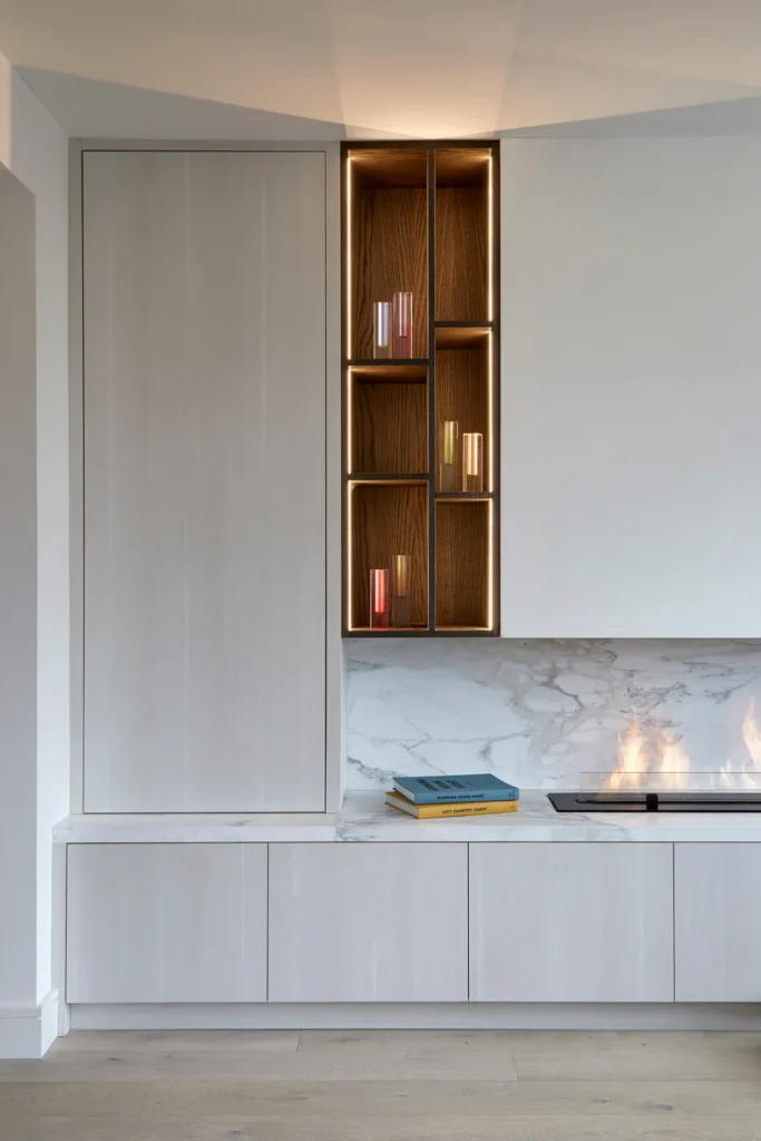Marlow interior designer Kate Lovejoy created this sleek grey cabinetry for storage in a lounge