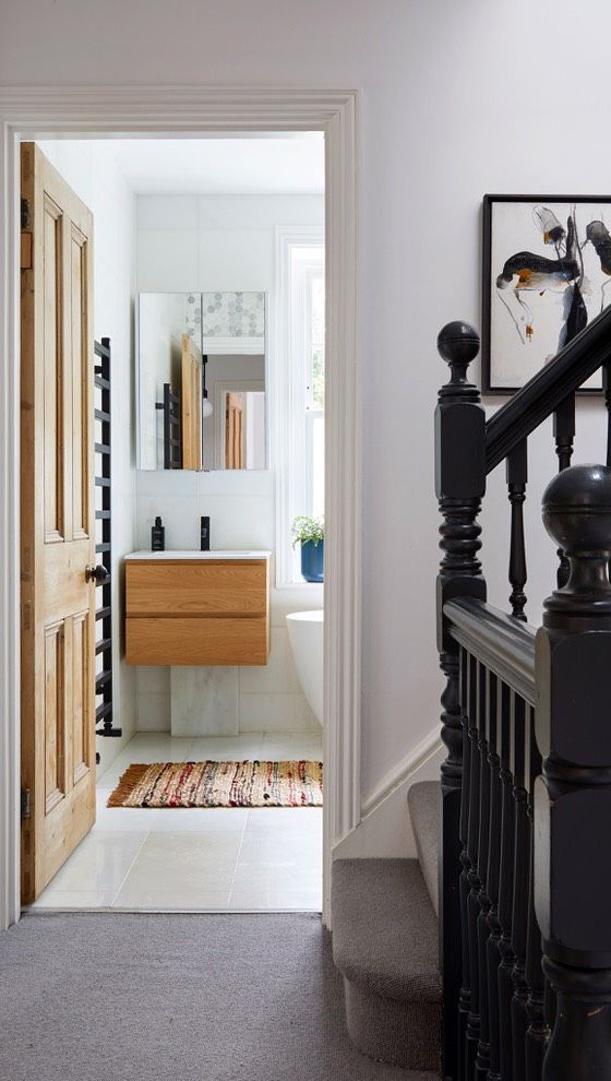 Stairs and landings work harder than we give them credit for. They’re not just a way to move between rooms – they’re part of the view from every space in your home. 
So, why not show them the same love as any other room? 

We did exactly that with these stunning original stairs and bannisters, painting them in the deepest grey. 
The result? A striking visual spine that grounds the entire house. 
Bold, timeless, and full of character. 💭🖤 

📷@annastathakiphoto 

#InteriorDesign #StaircaseGoals #KateLovejoyInteriors
#interiordesign #interiordesigner #interiordesignerberkshire #interiordesignerbuckinghamshire #interiordesigneroxfordshire #interiordesignersurrey #interiordesignerwestlondon #interiordesignermaidenhead #interiordesignermarlow #interiordesignerbeaconsfield #interiordesignerwindsor #interiordesignerreading #interiordesignerhenley #interiordesignerascot #interiordesignerwokingham #interiordesignerwandsworth #interiordesignerfulham #interiordesignerchalfontstgiles #interiordesignersunningdale